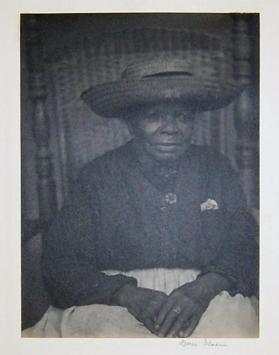 Portrait of a Woman with a Straw Hat